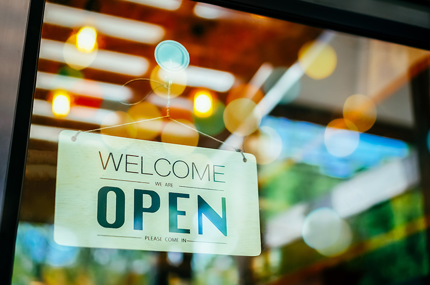 Open sign in store window